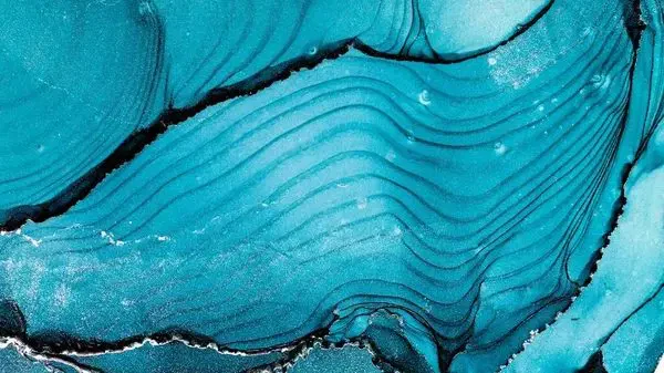 Abstract teal and black marble texture with wavy lines.