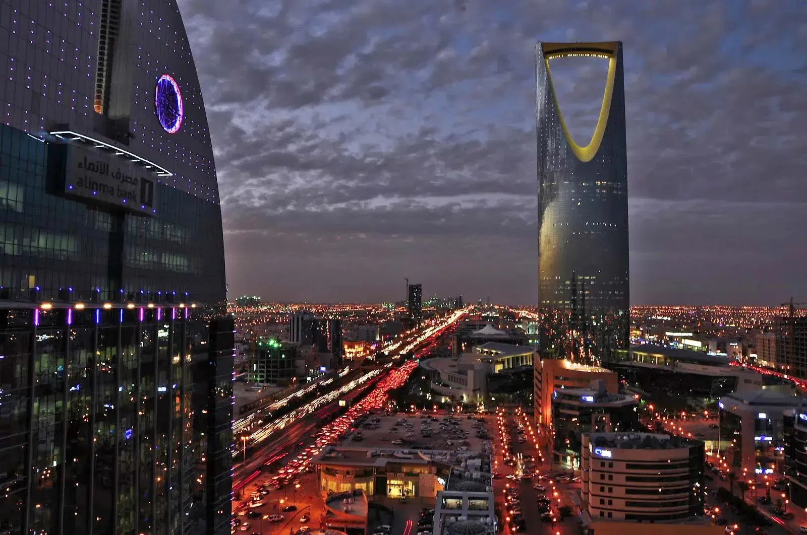 Nighttime view of Kingdom Centre and Al Rajhi Bank building in Riyadh, Saudi Arabia.