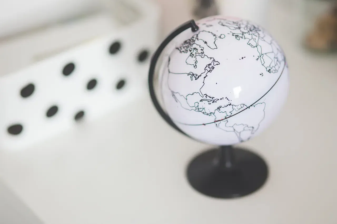 Small globe showing the Americas; international estate planning
