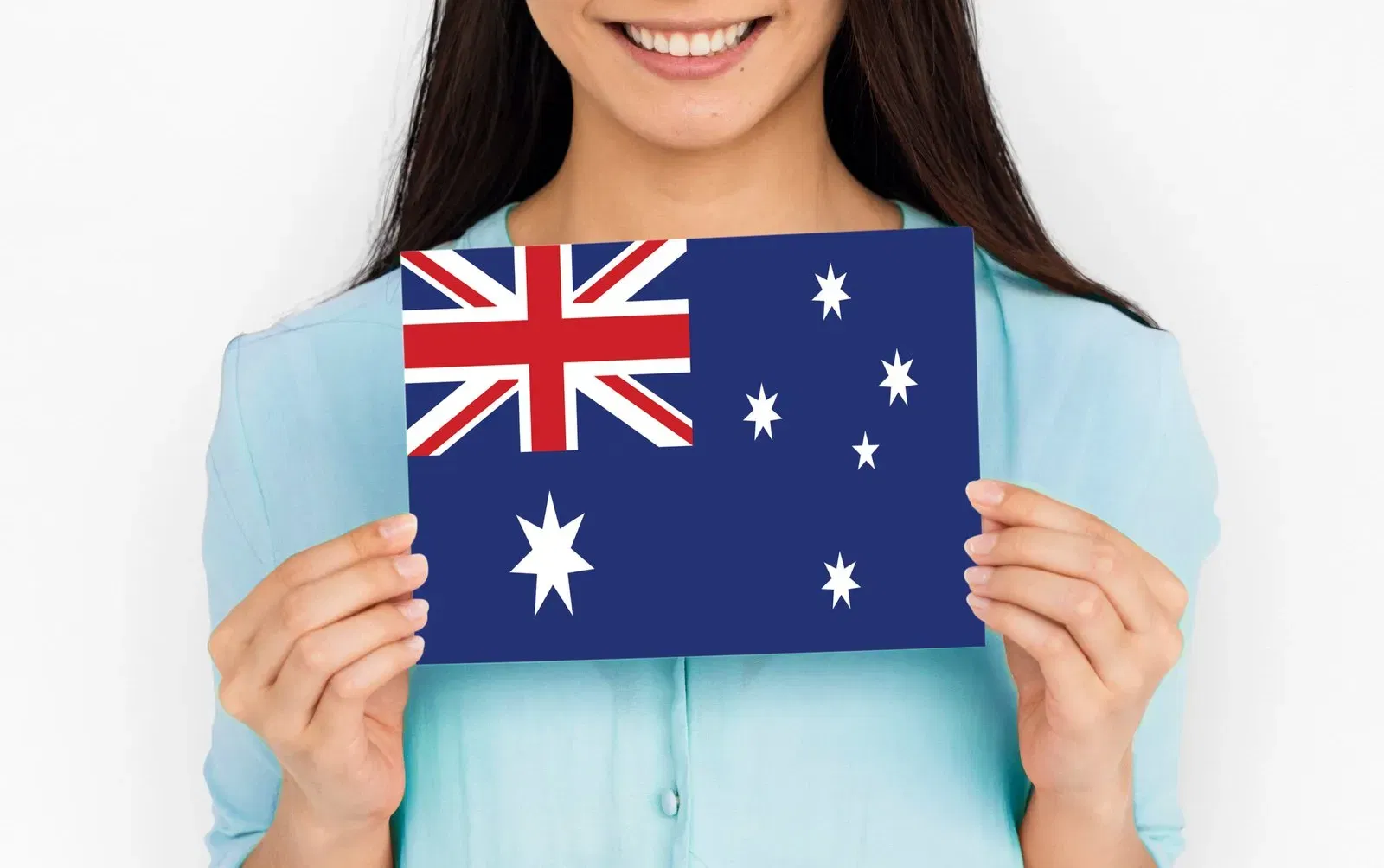 Woman holding Australian flag.