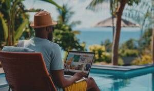 Man with laptop by pool, possibly planning offshore asset protection with trusts.