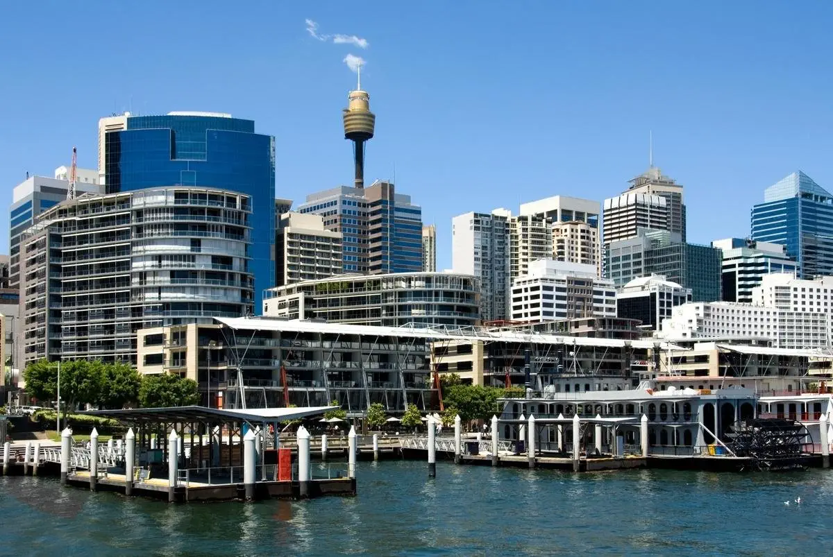 Sydney skyline with modern residential apartment buildings and the Sydney Tower.