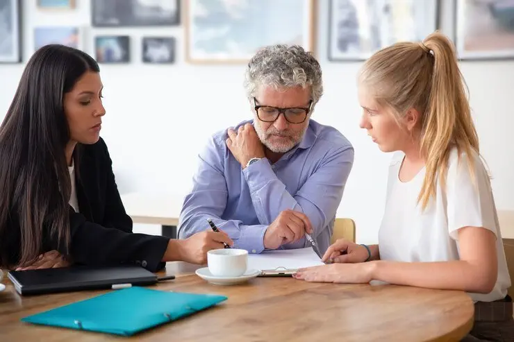 Lawyer consulting with clients about beneficiary rights in NSW.