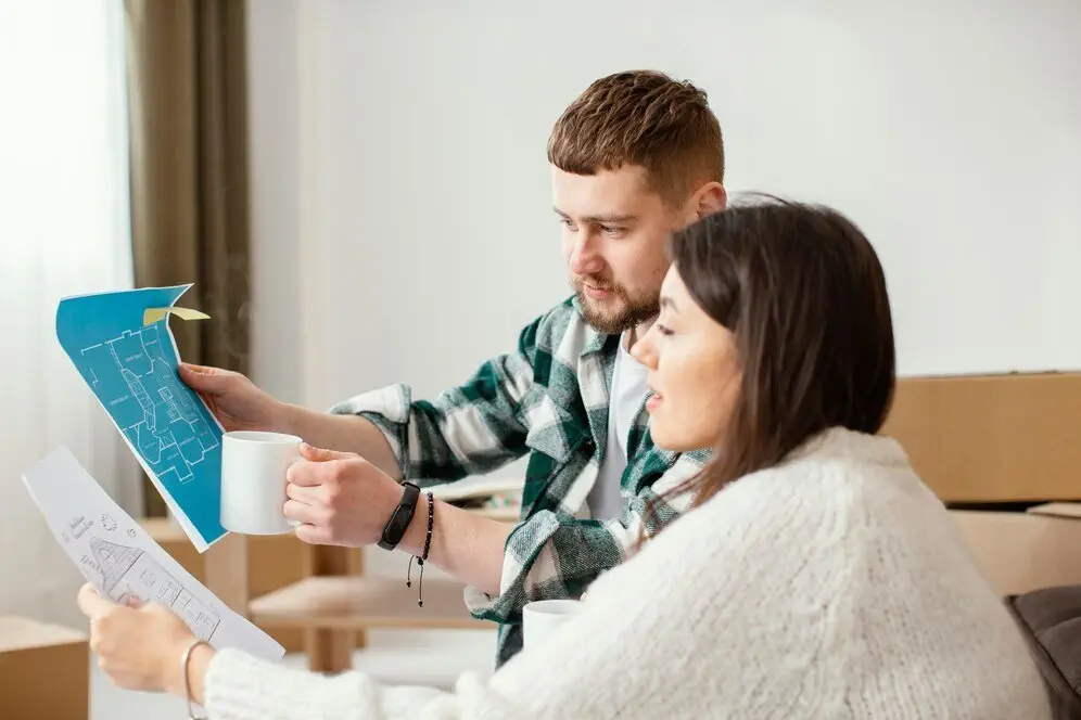 Couple reviewing NSW estate plan blueprints, planning for 2025.
