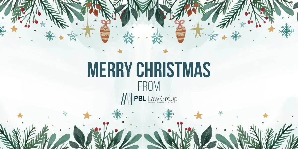 Merry Christmas from PBL Law Group. Festive holiday design with greenery and ornaments.